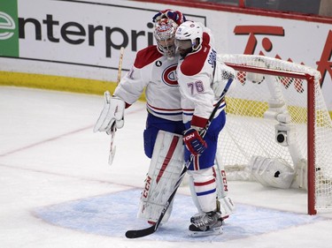 Montreal Canadiens' P.K. Subban (76)celebrates with goalie Carey Price (31)after defeating the Ottawa Senators in NHL playoff action in Ottawa, Sunday, April 26, 2015.