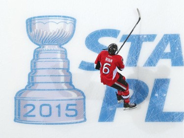 Bobby Ryan #6 of the Ottawa Senators skates over the in-ice Stanley Cup logo during warmup.
