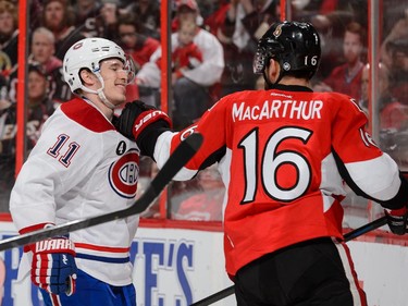 Clarke MacArthur #16 of the Ottawa Senators roughs up Brendan Gallagher #11 of the Montreal Canadiens in Game Six of the Eastern Conference Quarterfinals during the 2015 NHL Stanley Cup Playoffs at Canadian Tire Centre on April 26, 2015 in Ottawa, Ontario, Canada.