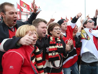 Fans enjoy the atmosphere prior to the start of a game between the Ottawa Senators and the Montreal Canadiens in Game Six of the Eastern Conference Quarterfinals during the 2015 NHL Stanley Cup Playoffs at Canadian Tire Centre on April 26, 2015 in Ottawa, Ontario, Canada.