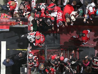 Craig Anderson #41, Bobby Ryan #6 and Mark Stone #61 walk through the players tunnel during warmups prior to a game against the Montreal Canadiens in Game Six of the Eastern Conference Quarterfinals during the 2015 NHL Stanley Cup Playoffs at Canadian Tire Centre on April 26, 2015 in Ottawa, Ontario, Canada.