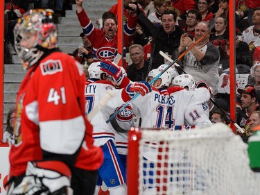 Brendan Gallagher #11 of the Montreal Canadiens celebrates his goal with teammates in Game Six of the Eastern Conference Quarterfinals against the Ottawa Senators during the 2015 NHL Stanley Cup Playoffs at Canadian Tire Centre on April 26, 2015 in Ottawa, Ontario, Canada.