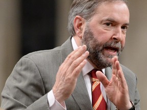 NDP Leader Tom Mulcair asks a question during Question Period in the House of Commons in Ottawa on Wednesday, April 1, 2015.