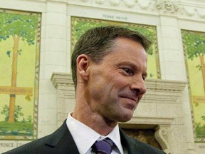 Nigel Wright, chief of staff for Prime Minister Stephen Harper, is shown appearing as a witness at the Standing Committee on Access to Information, Privacy and Ethics on Parliament Hill in Ottawa on Nov. 2, 2010. RCMP officials say Nigel Wright, former chief of staff to Prime Minister Stephen Harper, won't face criminal charges in connection with the ongoing Senate expenses scandal.