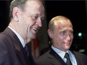 This file shot shows Jean Chretien and Russian leader Vladimir Putin