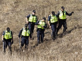 Ottawa Police search a ravine along Hunt Club Rd near Hwy. 417 Monday April 13, 2015. The search is in relation to the February 6, 2015 homicide of Yusuf Ibrahim.