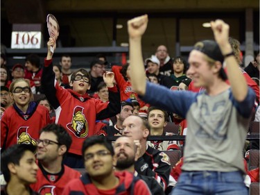 Ottawa Senators fans cheer at Canadian Tire Centre as the team wins the away game between Ottawa Senators vs. Philadelphia Flyers on Saturday, April 11, 2015.