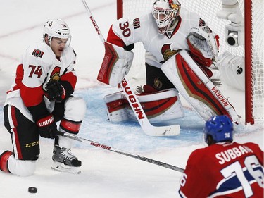 Ottawa Senators' Mark Borowiecki looks to block a shot by Montreal Canadiens' Max Pacioretty that eventually got past Sens' goalie, Andrew Hammond, while Montreal's P.K. Subban, bottom, looks on during the second period of game two during round one o the 2015 NHL Playoffs at the Bell Centre in Montreal Friday April 17, 2015. (Darren Brown/Ottawa Citizen)