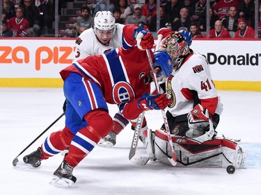 Alex Galchenyuk #27 of the Montreal Canadiens attempts to play the loose puck in front of Craig Anderson #41 of the Ottawa Senators during Game Five of the Eastern Conference Quarterfinals of the 2015 NHL Stanley Cup Playoffs at the Bell Centre on April 24, 2015 in Montreal, Quebec, Canada.