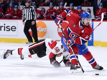 Tomas Plekanec #14 of the Montreal Canadiens takes off on a break-away in front of Mike Hoffman #68 of the Ottawa Senators during Game Five of the Eastern Conference Quarterfinals of the 2015 NHL Stanley Cup Playoffs at the Bell Centre on April 24, 2015 in Montreal, Quebec, Canada.