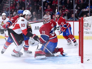 A shot by the Senators' Bobby Ryan gets past Canadiens goalie Carey Price with Mika Zibanejad on the doorstep at the Bell Centre on April 24, 2015 in Montreal.