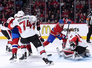 Brendan Gallagher #11 of the Montreal Canadiens looks for the rebounding puck in front of Craig Anderson #41 of the Ottawa Senators during Game Five of the Eastern Conference Quarterfinals of the 2015 NHL Stanley Cup Playoffs at the Bell Centre on April 24, 2015 in Montreal, Quebec, Canada.