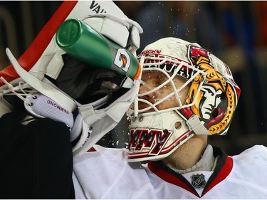 Andrew Hammond #30 of the Ottawa Senators takes a water break during the second period.