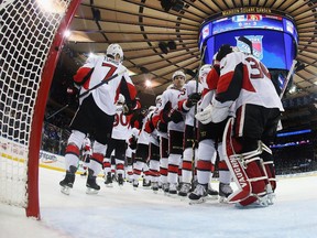 The Ottawa Senators celebrate a 3-0 shut out over the New York Rangers at Madison Square Garden. 
The season comes down to a matinee game in Philadelphia Saturday.