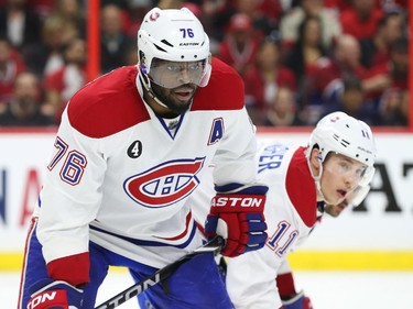 P.K. Subban (L) and Brendan Gallagher of the Montreal Canadiens against the Ottawa Senators during second period of NHL action at Canadian Tire Centre in Ottawa, April 26, 2015.