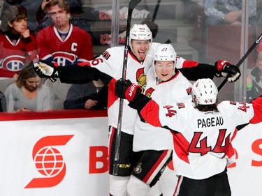 Patrick Wiecioch sticks out his tongue as he celebrates his goal with Curtis Lazar and Jean-Gabriel Pageau in the first period as the Ottawa Senators take on the Montreal Canadiens at the Bell Centre in Montreal for Game 5 of the NHL Conference playoffs on Friday evening.