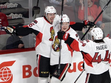 Ottawa Senators defenseman Patrick Wiercioch (46) celebrates with teammates Curtis Lazar and Jean-Gabriel Pageau after scoring the second goal against the Montreal Canadiens during first period of Game 5 NHL first round playoff hockey action Friday, April 24, 2015 in Montreal.