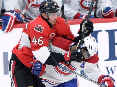 Ottawa Senators defenceman Patrick Wiercioch (46) cross checks Montreal Canadiens defenceman P.K. Subban (76) during the first period of game 3 of first round Stanley Cup NHL playoff hockey action in Ottawa on Sunday, April 19, 2015. Wiercioch went unpenalized on the play.