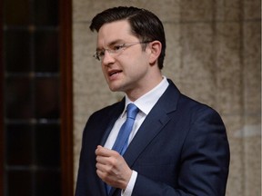 Minister of Employment and Social Development Pierre Poilievre answers a question during Question Period in the House of Commons in Ottawa on Monday, April 20, 2015.