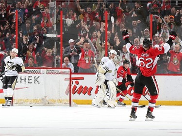 Eric Gryba #62 and Erik Condra #22 of the Ottawa Senators celebrate a shorthanded goal against Marc-Andre Fleury #29, Patric Hornqvist #72 and Derrick Pouliot #51 of the Pittsburgh Penguins.