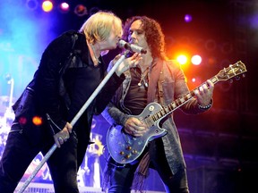 LOS ANGELES, CA - JUNE 08:  Singer Joe Elliott (L) and musician Vivian Campbell of Def Leppard perform at the after party for the premiere of Warner Bros. Pictures' "Rock Of Ages" at Hollywood and Highland on June 8, 2012 in Los Angeles, California.