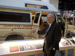 Terry Fox's father, Rolly, beside the van used in the Marathon of Hope.
