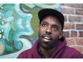 Rapper Shad is shown in an interview with The Canadian Press in Toronto on Thursday October 17, 2013.