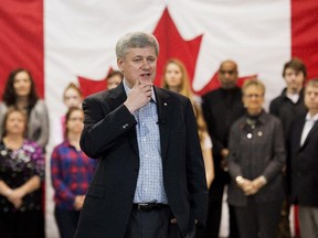 Prime Minister Stephen Harper makes an announcement at Framecraft Ltd. in St. Catharines, Ont., on Thursday, January 22, 2015. The Conservative government is considering a strong focus on the manufacturing sector in the upcoming budget, part of a general shift in attention towards Ontario and its prospective voters. THE CANADIAN PRESS/Nathan Denette