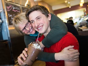 Tammy Giuliani, owner of Stella Luna and a master gelato chef, embraces son Matthew.