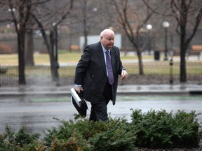 Suspended Sen. Mike Duffy arrives at the courthouse for his trial in Ottawa Monday, April 20, 2015.