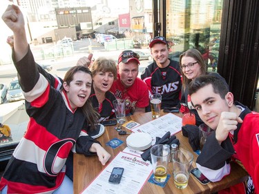 The Cheslock / Albert family getting into the spirit at Sens House as Sens fans pour onto the Sens Mile along Elgin St and the Sens Square in Byward Market to watch Friday's game between Montreal Canadiens and Ottawa Senators being played in Montreal.