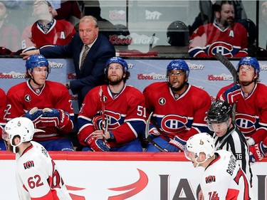 The Montreal bench looks at the play on the screen while Michel Therrien stares at the Senators skating by after the Condra goal in the third period as the Ottawa Senators take on the Montreal Canadiens at the Bell Centre in Montreal for Game 5 of the NHL Conference playoffs on Friday evening.