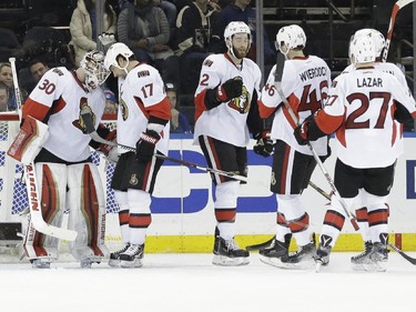 The Ottawa Senators celebrate after defeating the New York Rangers.