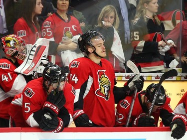 The Ottawa Senators show their dejection after losing their series against the Montreal Canadiens during third period of NHL action at Canadian Tire Centre in Ottawa, April 26, 2015.