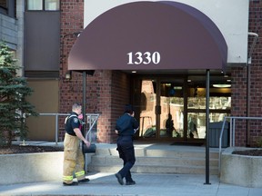 The scene of an apparent fatal fire in a high-rise apartment building located at 1330 Richmond Rd.  Assignment - 120483 Photo taken at 08:34 on April 29. (Wayne Cuddington / Ottawa Citizen)