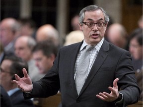 Treasury Board President Tony Clement responds to a question during Question Period in the House of Commons Monday March 23, 2015 in Ottawa.