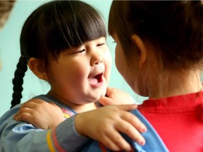 Young May Arngna'naaq-boyer practises throat singing with her pal. The Ottawa Inuit Children's Centre has the only Inuit kindergarten south of the Arctic — which is helping to strengthen a growing community of Inuit people living in urban centres.