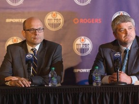 Edmonton Oilers President and General Manager Peter Chiarelli (left) announces Oilers new head coach Todd McLellan (right) on May 19, 2015.