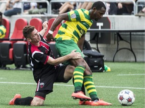 Ottawa Fury #18 Brandon Poltronieri tried to stop Tampa Bay Rowdies #2 Darnell King at TD Place Stadium at Lansdowne Park.