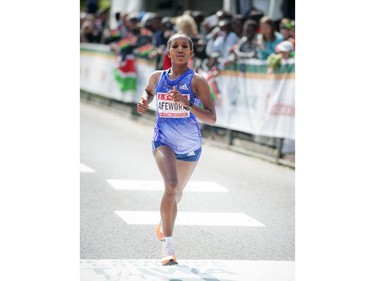 Abebech Afework of Ethiopia is the third woman to finish the marathon at Tamarack Ottawa Race Weekend, Sunday, May 24, 2015.
