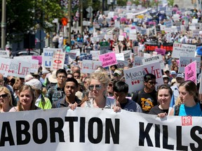 Police estimated that 8,000 people took part  in the annual March for Life rally against abortion. Organizers say 25,000 attended.