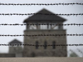 A picture taken on April 28, 2015, shows a barbed wire fence at the former Nazi concentration camp Mauthausen, northern Austria.