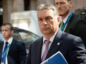 Hungary's Prime minister Viktor Orban arrives at the European Council headquarters for an extraordinary summit of European leaders to deal with a worsening migration crisis, on April 23, 2015 in Brussels.