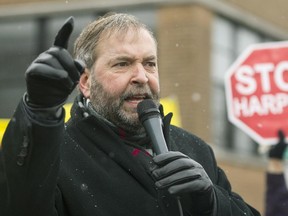 NDP Leader Thomas Mulcair speaks during a protest on a national day of action against Bill C-51, the government's proposed anti-terrorism legislation, in Montreal, Saturday, March 14, 2015. THE CANADIAN PRESS/Graham Hughes

NA0316-mdt-mulcair