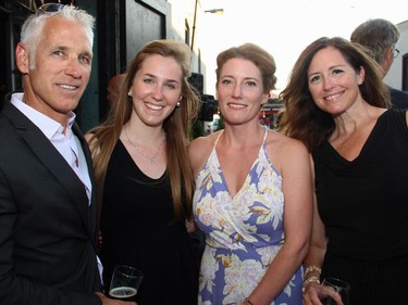 Bill Duncan with his daughter, Emily, singer-songwriter and businesswoman Kathleen Edwards and lead event designer Tania Kratt at the third annual Ottawa Riverkeeper Gala held Wednesday, May 27, 2015, at Albert Island.