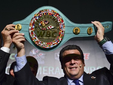 The president of the World Box Council,  Mauricio Sulaiman holds on April 21, 2015, in Mexico City, the belt, made in Mexico, that will be delivered to the winner of the fight between filipino Manny Pacquiao and US Floyd Mayweather Jr. next May 2.
