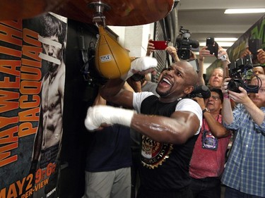 WBC/WBA welterweight champion Floyd Mayweather Jr. works out at the Mayweather Boxing Club on April 14, 2015 in Las Vegas, Nevada. Mayweather Jr. will face WBO welterweight champion Manny Pacquiao in a unification bout on May 2, 2015 in Las Vegas.