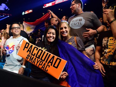 Boxing fans show their support ahead of the weigh-in on May 1, 2015 in Las Vegas, Nevada one day before the "Fight of the Century" between Manny Pacquiao and Floyd Mayweather on May 2 at the MGM Grand Garden Arena here.