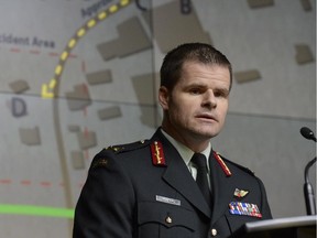File photo shows then Brig.-Gen. Mike Rouleau addressing a news conference in Ottawa, Tuesday, May 12, 2015.
