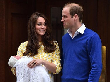 Britain's Prince William, Duke of Cambridge, and his wife Catherine, Duchess of Cambridge show their newly-born daughter, their second child, to the media outside the Lindo Wing at St Mary's Hospital in central London, on May 2, 2015.  The Duchess of Cambridge was safely delivered of a daughter weighing 8lbs 3oz, Kensington Palace announced. The newly-born Princess of Cambridge is fourth in line to the British throne.